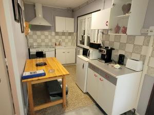 Chalets Chalet chez Sara au bord du canal : photos des chambres
