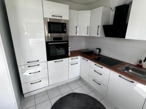 Apartment Ferienwohnung mit Grünem Blick Terrasse & Neu saniert Bordinghaus 24h Check-In in Freudenberg am Main