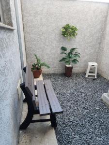 Apartamento confortável com garden