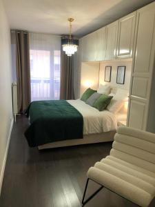 Appartements Le confort et l-elegance a deux pas de Paris : photos des chambres
