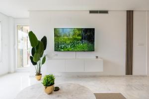 Luxe appartement met jacuzzi, uitzicht & zwembaden