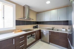 Luxe appartement met jacuzzi, uitzicht & zwembaden