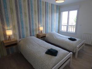 Appartements Le Jules Verne, appartement en plein centre-ville : photos des chambres