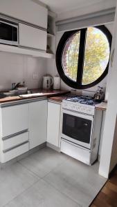 Luminoso Ambiente, con cochera en lo mejor de La Perla