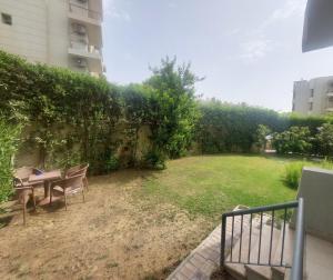 شقة مميزة ارضى بحديقة بكمبوند ذا ادريس الشيخ زايد