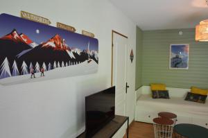 Appartements 3 vallees, piscine et sauna : photos des chambres