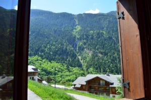 Appartements 3 vallees, piscine et sauna : photos des chambres