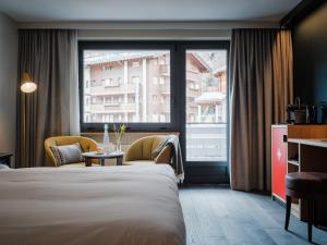 Deluxe Double Room with Matterhorn View room in Hotel National Zermatt