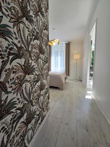Appartements Charmant appartement chambre, cuisine et salle de bain avec balcon sur Jardin Massey : photos des chambres
