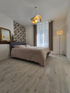 Appartements Charmant appartement chambre, cuisine et salle de bain avec balcon sur Jardin Massey : Appartement 1 Chambre