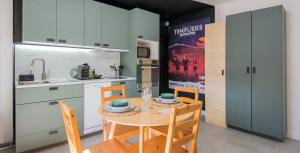 Appartements Le Voyage : photos des chambres