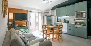 Appartements Le Voyage : photos des chambres