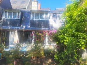 Appartements Au puits de l'abbaye : photos des chambres