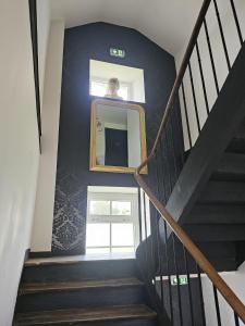 Appartements L-Haussmannien Presbytere St Herve : photos des chambres