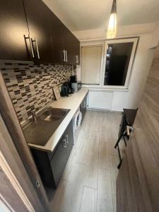 Apartament dragut si spatios in centrul orasului - Parcare gratuita