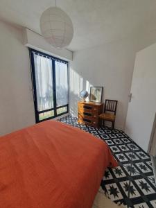 Appartements L'atelier cosy : photos des chambres