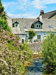 Cottage On The Brook