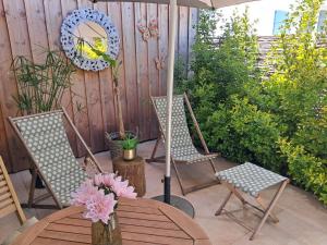 Appartements Le Patio du bourg - Studio entre lac et ocean : photos des chambres