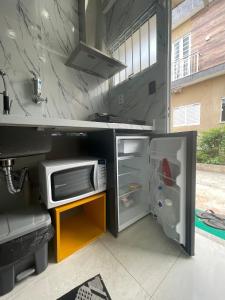 Adorável Tiny house 5, ar, cozinha completa, wifi e tv smart