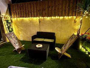 Appartements Grand jardin - Climatisation - parking privatif : photos des chambres