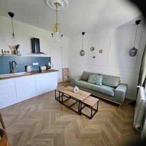 Appartements L-Haussmannien Presbytere St Herve : photos des chambres
