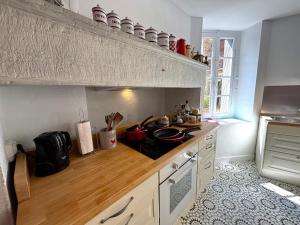 Maisons de vacances LE TERME maison en pierre dans village tous commerces au coeur du Perigord proche Sarlat et riviere Dordogne : photos des chambres