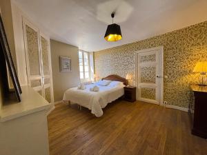 Maisons de vacances LE TERME maison en pierre dans village tous commerces au coeur du Perigord proche Sarlat et riviere Dordogne : photos des chambres