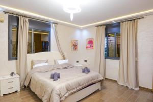 Al Nakheel - Ferme Spacieuse avec Grande Piscine Privée et Espace Vert