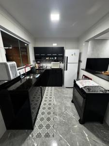 Condomínio pé na areia Itanhaém