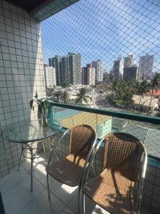 Aconchego no Canto do Forte - Ar Condicionados - Tvs Grandes - Wi-fi e Estacionamento Incluso!