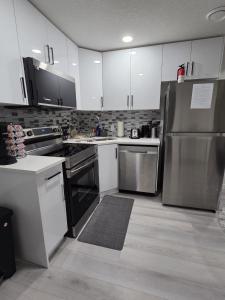 Elegant & Cozy 2 Bdrm Basement suite near WEM