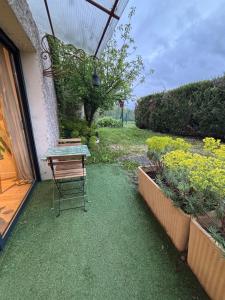 Appartement chez maison hôte rez de jardin