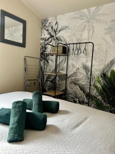 Appartements Appartement ambiance tropicale : photos des chambres