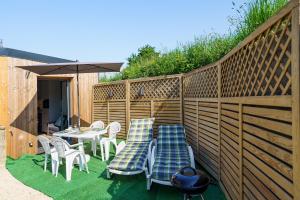 Maisons de vacances Ty Koad - maison avec grande terrasse : Maison 1 Chambre