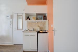 Appartements Urban - 800 m Gare- Hyper center - WiFi - Climatise : photos des chambres