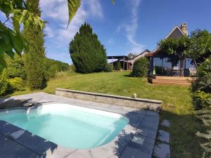 Maisons de vacances Maison en pierre avec piscine : photos des chambres