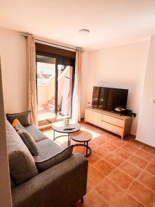 Apartamento con acogedora terraza