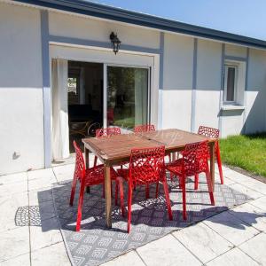 Appartements Appartement de vacances avec terrasse et petit jardin : photos des chambres