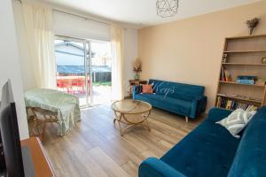 Appartements Appartement de vacances avec terrasse et petit jardin : photos des chambres
