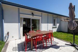 Appartements Appartement de vacances avec terrasse et petit jardin : photos des chambres