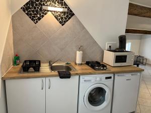 Appartements Epices 1 au coeur du centre ville historique de Serignan : photos des chambres