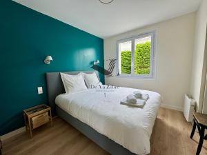 Maisons de vacances La Verrerie - Maison coeur de ville avec jardin : photos des chambres