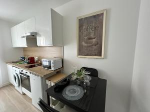 Appartements Appartement lumineux et moderne, proche transports : photos des chambres