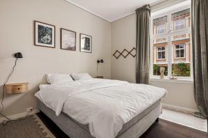 DINBNB Apartments l 250m to Bryggen l Backyard l Smart-TV l 6 Guests