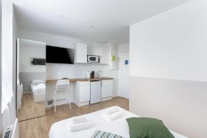 Appartements Fee Morgane : photos des chambres