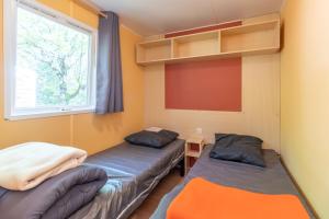 Maisons de vacances Mobilhome avec terrasse 4 personnes : photos des chambres