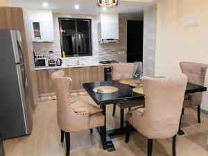 elegantly and beautifully furnished two bedroom apartment with well equipped gym heated swimming pool children playing ground and amazing scenic views