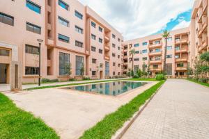 3 min de Guéliz - Appart avec balcon , vue piscine