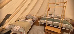 Tentes de luxe Camping le Monteil : photos des chambres