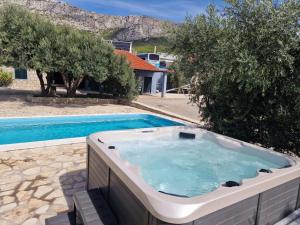 Luxury private villa complex with pool and jacuzzi